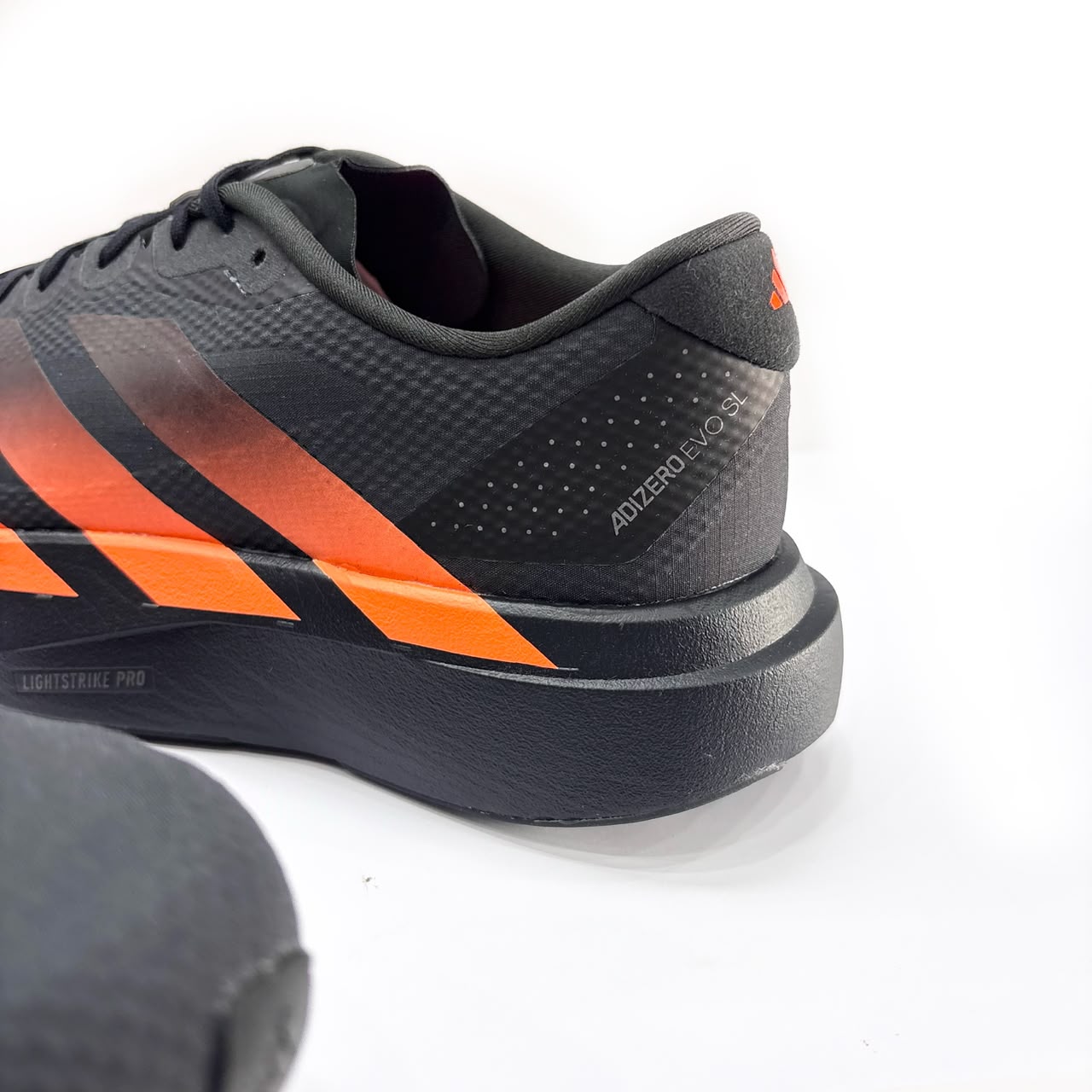 ADIDAS ADIZERO EVOS SL WOVEN CARBON LUCID ORANGE